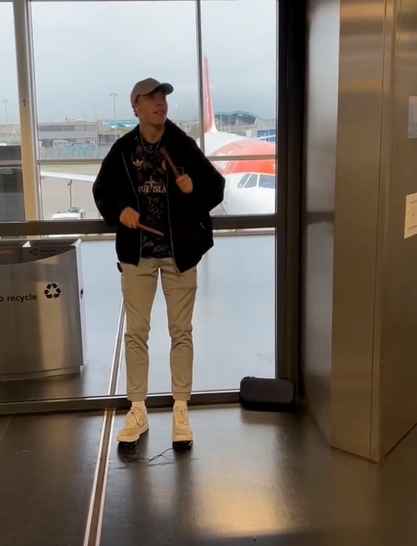 Or at the airport (with earbuds)