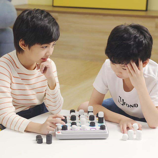 two children playing GiiKER Smart Four to build logic and train focus.