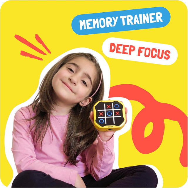Young girl practicing focus and memory with the GiiKER Tic-Tac-Toe smart trainer.