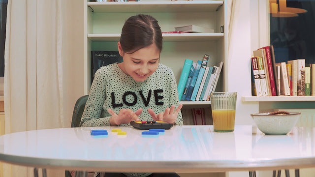 Demo video of a child solving a challenging level on the GiiKER Super Slide smart puzzle